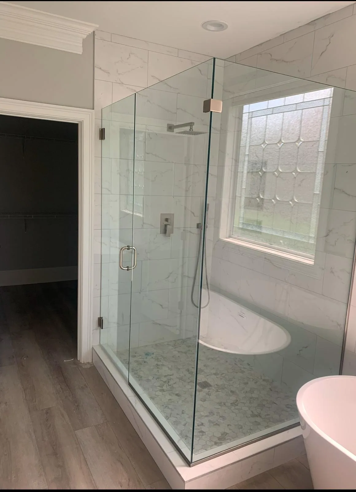 Luxury frameless shower door installation